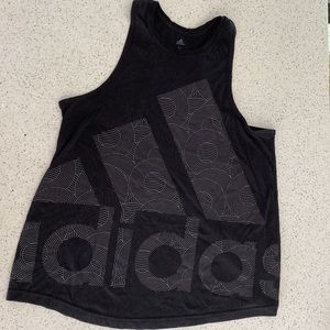 Adidas - M tank top in black with Addidas design on the front.